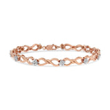 1/2 Ct. T.W. Diamond Cluster and Infinity Weave Link Bracelet in 10K Rose Gold