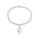 Pulsera rolo con dije de lazo y corazón con diamantes de 1/10 ct. p.t. en plata de ley y oro amarillo de 10K