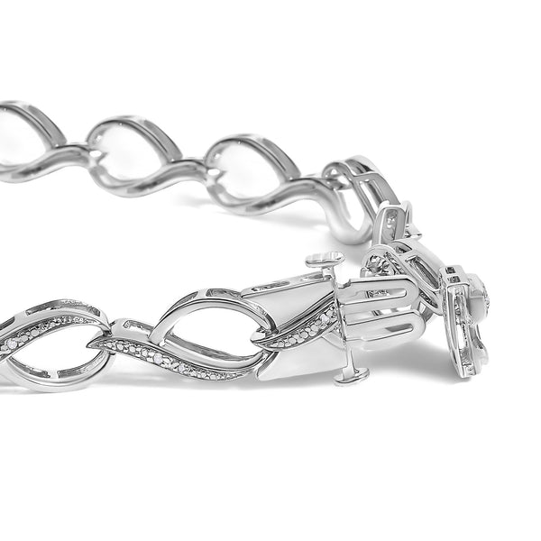 Pulsera de eslabones de remolino con detalle de diamante de 1/10 ct. p.t. en plata de ley, foto 2