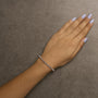 Pulsera tenis de eslabones de rueda de círculo calado con diamantes de 1/10 ct. p.t. en plata de ley, foto 9