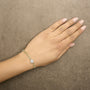 5/8 Ct. T.W. Diamond Cluster Curb Chain Bracelet in 14K Yellow Gold, photo 3
