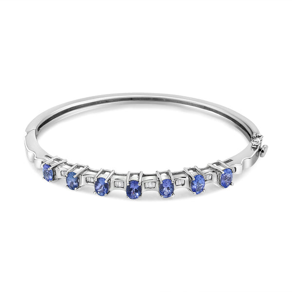 1/4 Ct. T.W. 5mm Oval Blue Tanzanite and Diamond Bangle in 14K White Gold, photo 1