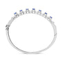 Brazalete rígido con tanzanita azul ovalada de 5mm y diamantes de 1/4 ct. p.t. en oro blanco de 14K, foto 5