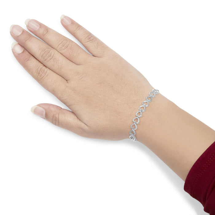 Pulsera bolo de eslabones de corazón con diamantes de 1/10 ct. p.t. en plata de ley, foto 3