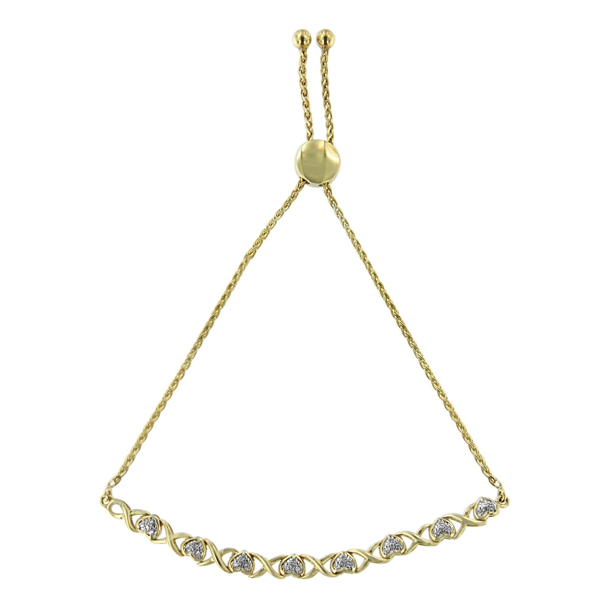 1/10 Ct. T.W. Diamond Heart and X-Link Adjustable Bolo Bracelet in 10K Yellow Gold over Sterling Silver, photo 1