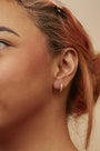 Aretes de aro con 10 diamantes redondos de 1/2 ct. p.t. en oro amarillo de 10K, foto 3