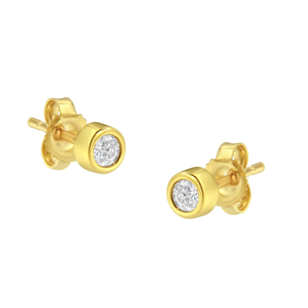 Aretes de botón de bisel con diamantes redondos casi incoloros de 0.15 ct. p.t. en oro de 10K, foto 1
