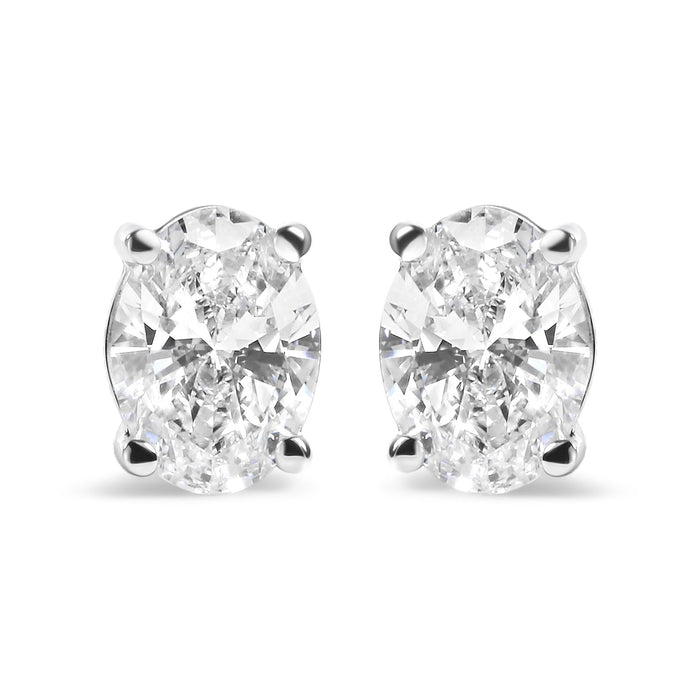 Aretes de botón solitarios de garras con diamantes ovalados cultivados en laboratorio de 0.75 ct. p.t. en oro blanco de 14K, foto 1