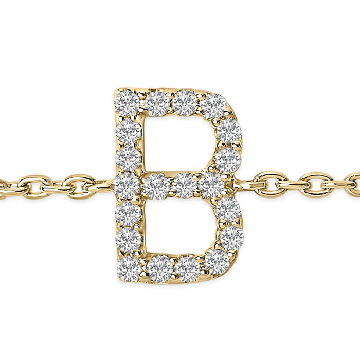 Pulsera de eslabones con dije de inicial A-Z y detalle de diamante en oro amarillo de 10K
