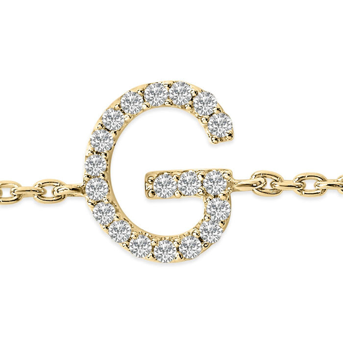 Pulsera de eslabones con dije de inicial A-Z y detalle de diamante en oro amarillo de 10K