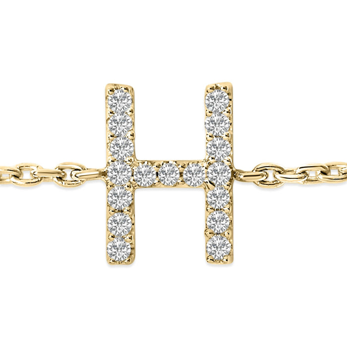 Pulsera de eslabones con dije de inicial A-Z y detalle de diamante en oro amarillo de 10K
