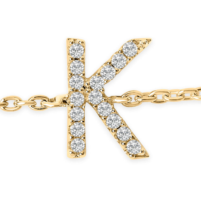 Pulsera de eslabones con dije de inicial A-Z y detalle de diamante en oro amarillo de 10K