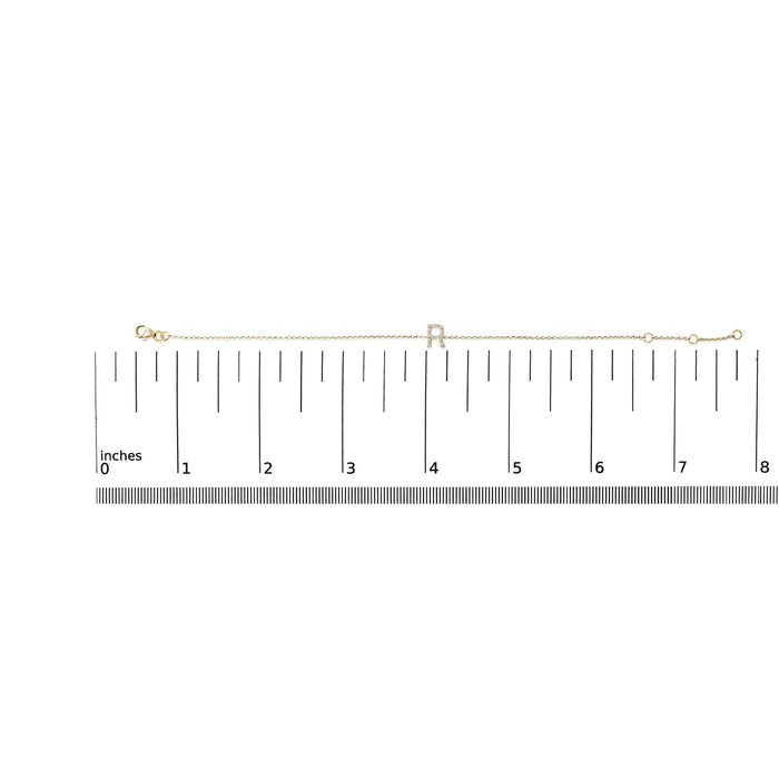 Pulsera de eslabones con dije de inicial A-Z y detalle de diamante en oro amarillo de 10K