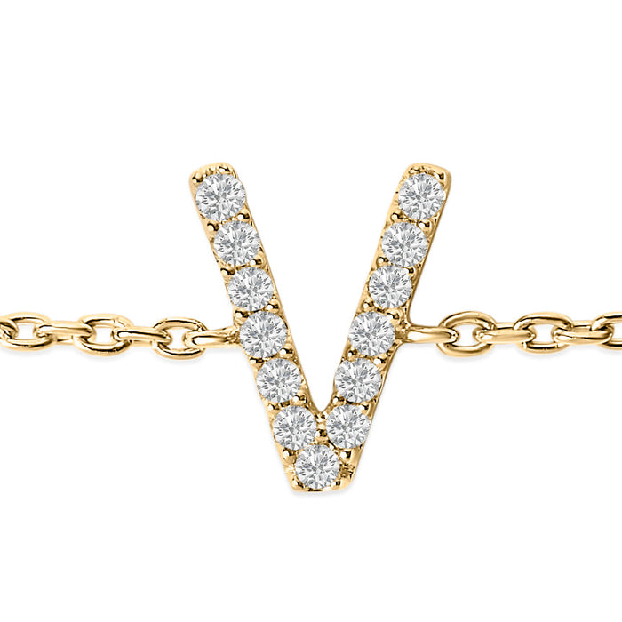 Pulsera de eslabones con dije de inicial A-Z y detalle de diamante en oro amarillo de 10K