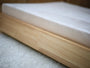 Close-up of the Haven's hardwood frame edge and mattress