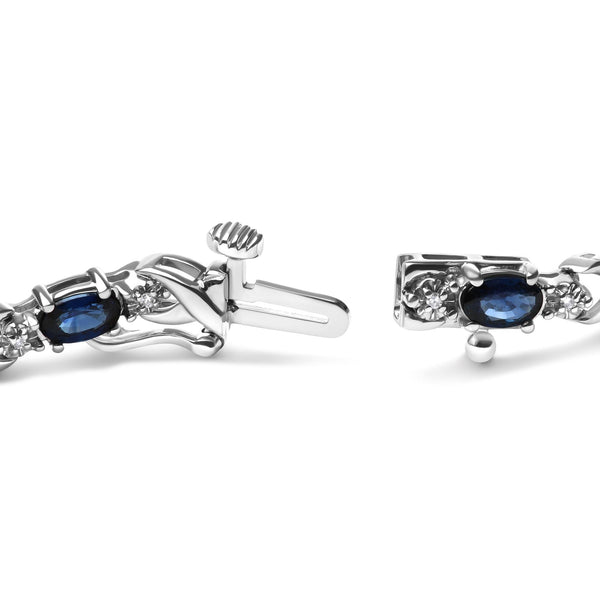 1/10 Ct. T.W. 5x4mm Oval Sapphire Gemstone and Diamond Prong-Set X Link Bracelet in 10K White Gold, photo 2