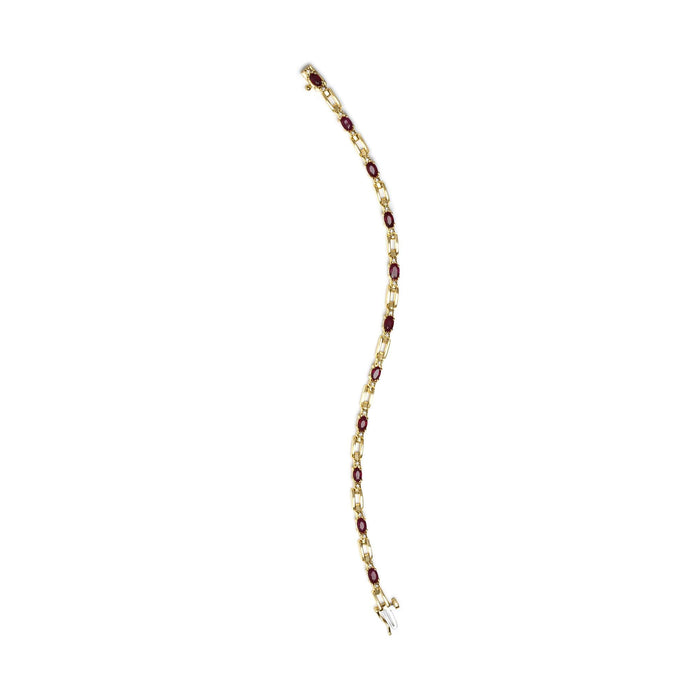 1/10 Ct. T.W. Oval Ruby and Diamond Bar Prong-Set Bracelet in 10K Yellow Gold, photo 5