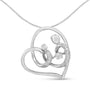 1/6 Ct. T.W. Diamond Mother and Child Heart Pendant Necklace in Sterling Silver, photo 1