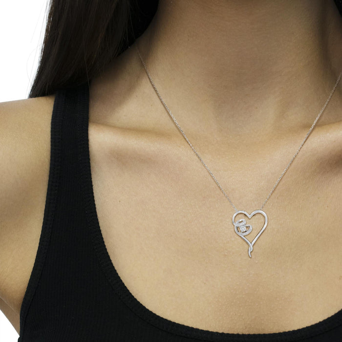 1/10 Ct. T.W. 12 Diamond Polished Heart Pendant Necklace in Sterling Silver, photo 3