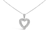 Collar con colgante de corazón calado con diamantes baguette y redondos de 1 ct. p.t. en plata de ley