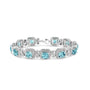 Pulsera tenis cuadrada con topacio azul talla cojín de 7x7 mm y diamantes de 1/10 ct. p.t. en plata de ley, foto 1