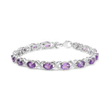 Pulsera de eslabones en X con amatista ovalada de 7x5mm y detalle de diamante en plata de ley