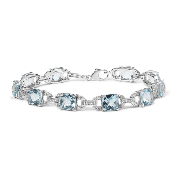 Pulsera tenis con topacio azul talla cojín de 7x7 mm y diamantes talla redonda de 1/20 ct. p.t. en plata de ley, foto 1