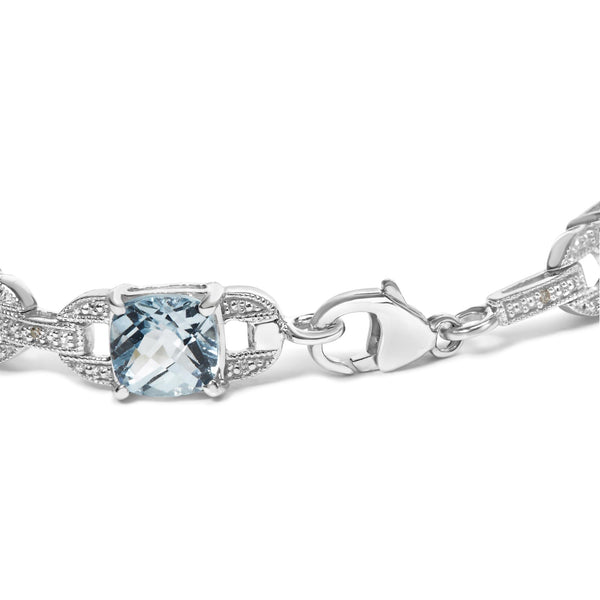 Pulsera tenis con topacio azul talla cojín de 7x7 mm y diamantes talla redonda de 1/20 ct. p.t. en plata de ley, foto 2