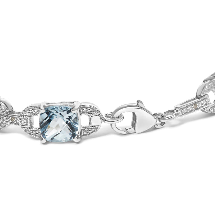 Pulsera tenis con topacio azul talla cojín de 7x7 mm y diamantes talla redonda de 1/20 ct. p.t. en plata de ley, foto 2