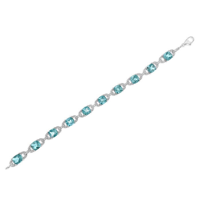 Pulsera tenis con topacio azul talla cojín de 7x7 mm y diamantes talla redonda de 1/20 ct. p.t. en plata de ley, foto 6