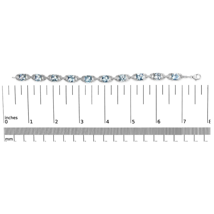 Pulsera tenis con topacio azul talla cojín de 7x7 mm y diamantes talla redonda de 1/20 ct. p.t. en plata de ley, foto 7