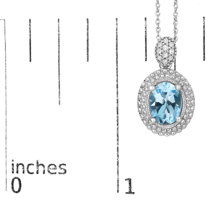 Collar con colgante de topacio azul ovalado y detalle de diamante con halo de cuentas en plata de ley, foto 5