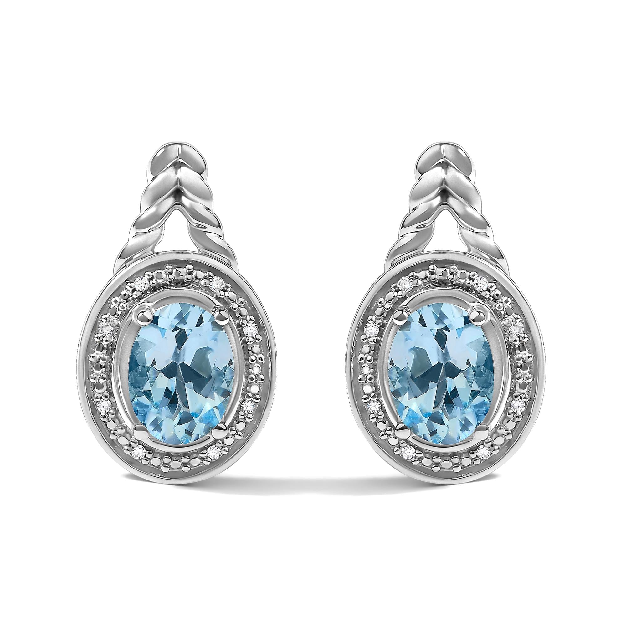 Oval Blue Topaz and Diamond Accent Twist and Halo Drop Earrings in Sterling Silver, photo 1