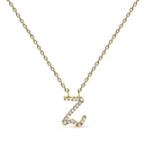 Collar con colgante de inicial A-Z estilo cursivo con detalle de diamante en oro amarillo de 14K