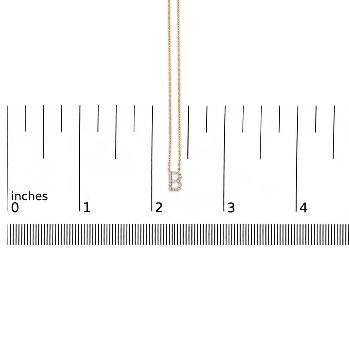 Collar con colgante de inicial A-Z en letra de molde con detalle de diamante en oro amarillo de 10K