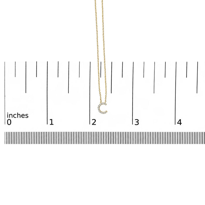 Collar con colgante de inicial A-Z en letra de molde con detalle de diamante en oro amarillo de 10K