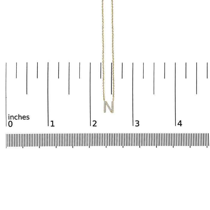 Collar con colgante de inicial A-Z en letra de molde con detalle de diamante en oro amarillo de 10K