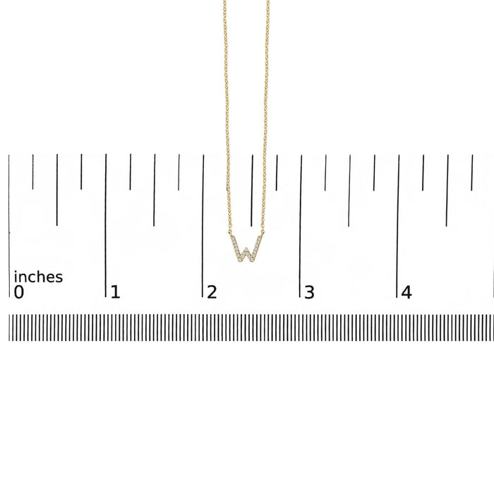 Collar con colgante de inicial A-Z en letra de molde con detalle de diamante en oro amarillo de 10K
