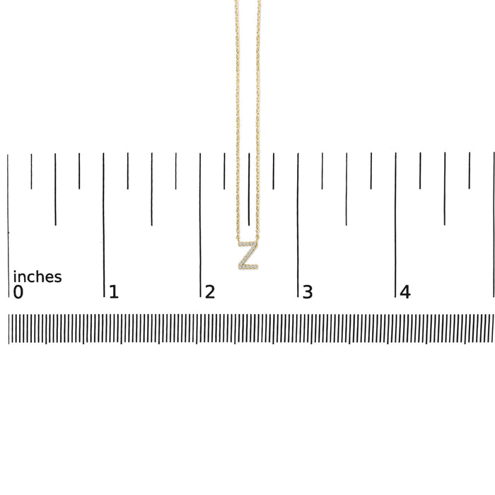 Collar con colgante de inicial A-Z en letra de molde con detalle de diamante en oro amarillo de 10K
