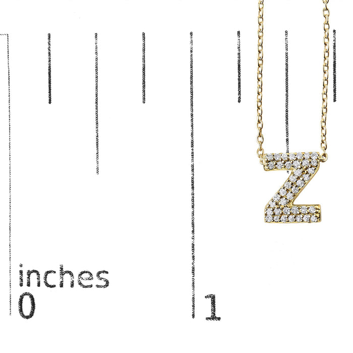 Collar con colgante de inicial A-Z estilo burbuja con detalle de diamante en oro amarillo de 10K