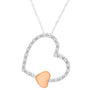 1/6 Ct. T.W. Diamond Floating Heart Pendant Necklace in 10K Two-Tone Gold, photo 1