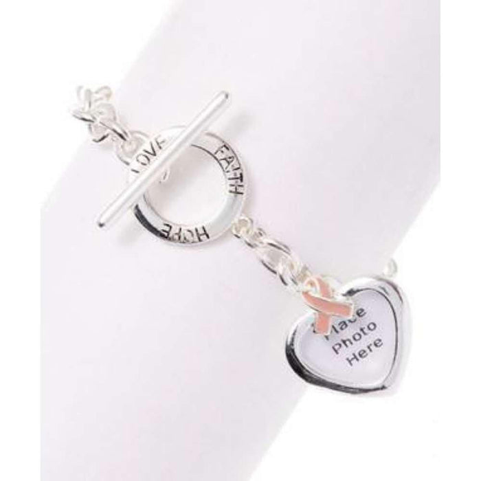 Pulsera con lazo rosa y dije de corazón para foto, foto 1