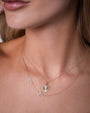 Dije de corazón acanalado chico con diamantes en oro de 14K, foto 2
