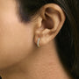 Aretes de aro Huggie con diamantes de 1/5 ct. p.t. en oro de 14K, foto 7