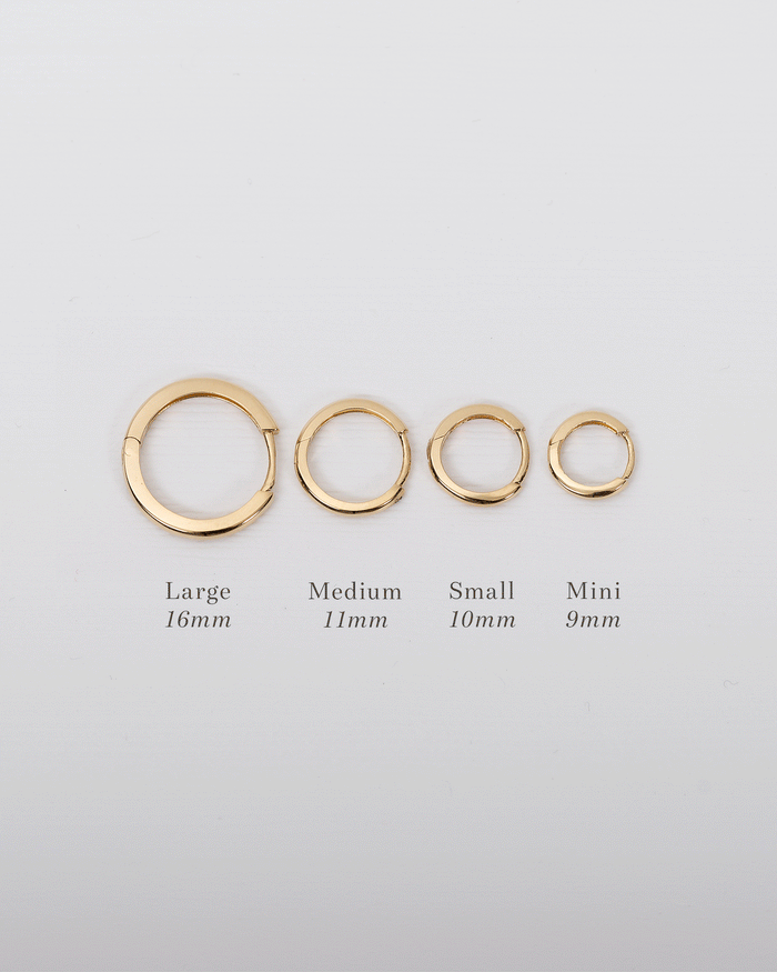 Aretes de aro huggie medianos en oro de 14K, foto 4
