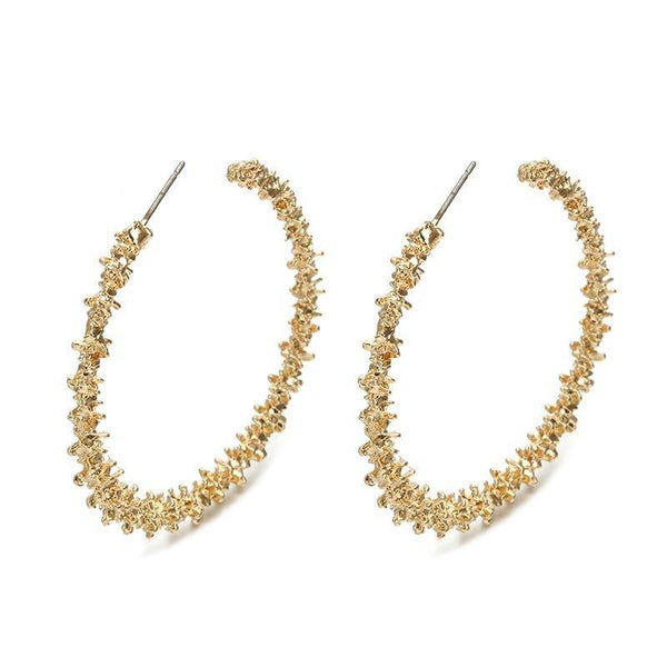 Aretes de aro gruesos dorados tipo pepita, foto 1