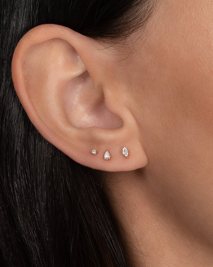 Arete de botón de diamante pera de tres garras en oro de 14K, foto 3