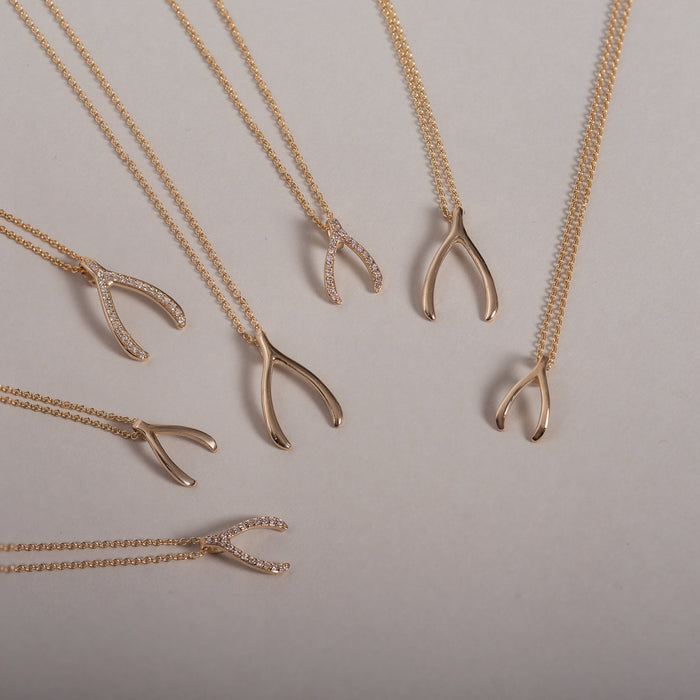 Dije de hueso de la suerte mini en oro de 14K, foto 5