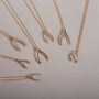 Collar infantil con mini hueso de la suerte en oro de 14K, foto 3