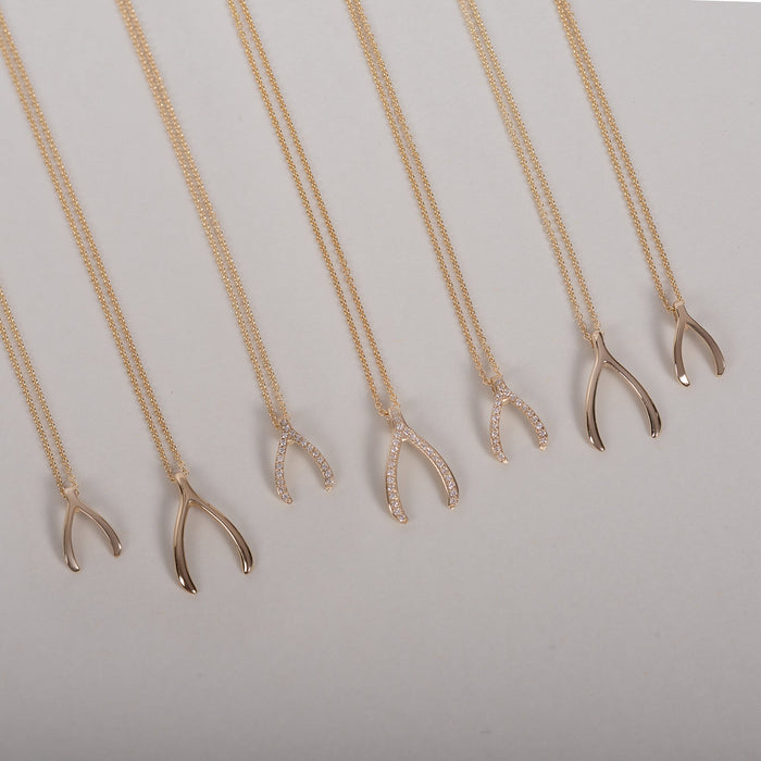 Dije de hueso de la suerte mini en oro de 14K, foto 6